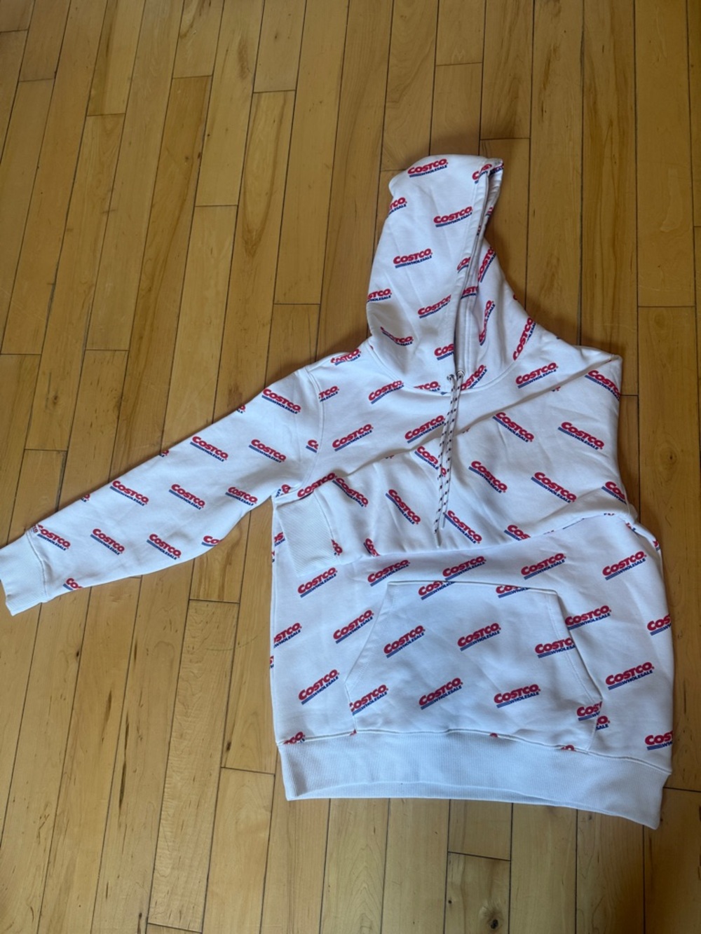 Kirkland Signature White Pullover Hoodie with Red Logo Print